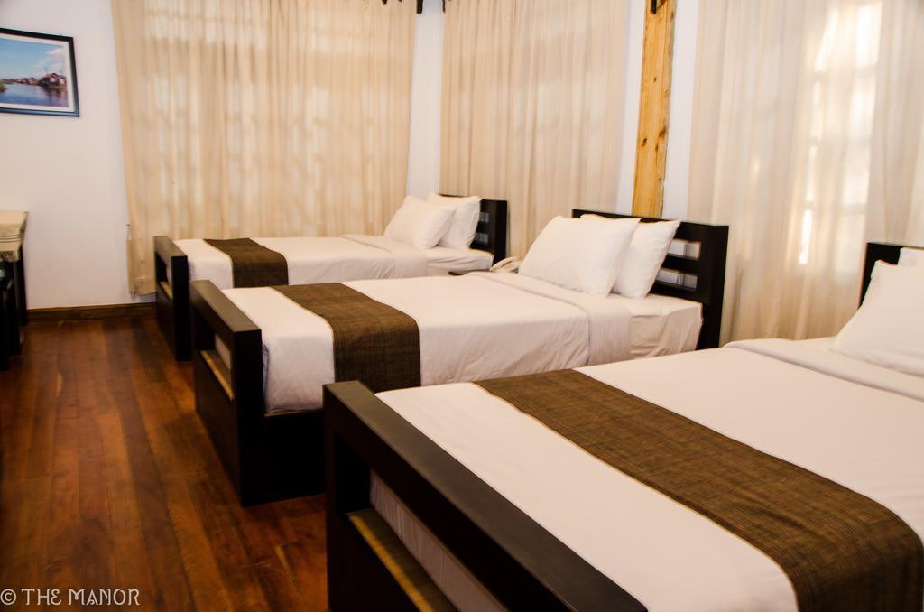 ניאונגשווה The Manor Hotel חדר תמונה